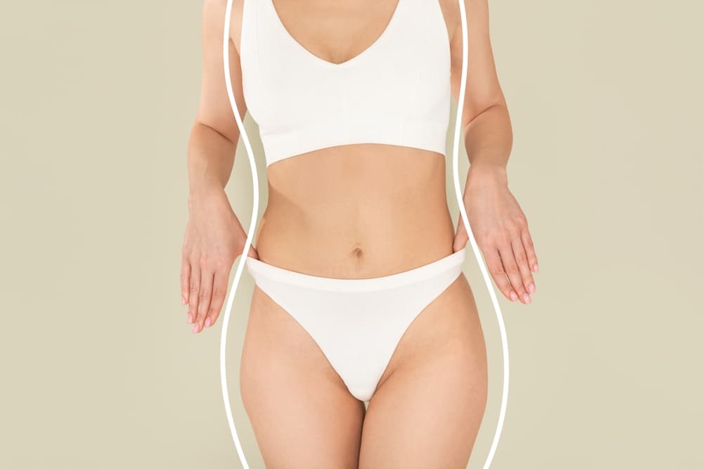 Cropped view of young woman in white underwear showing slim waist and fit body, concept of EON Tech body contouring.